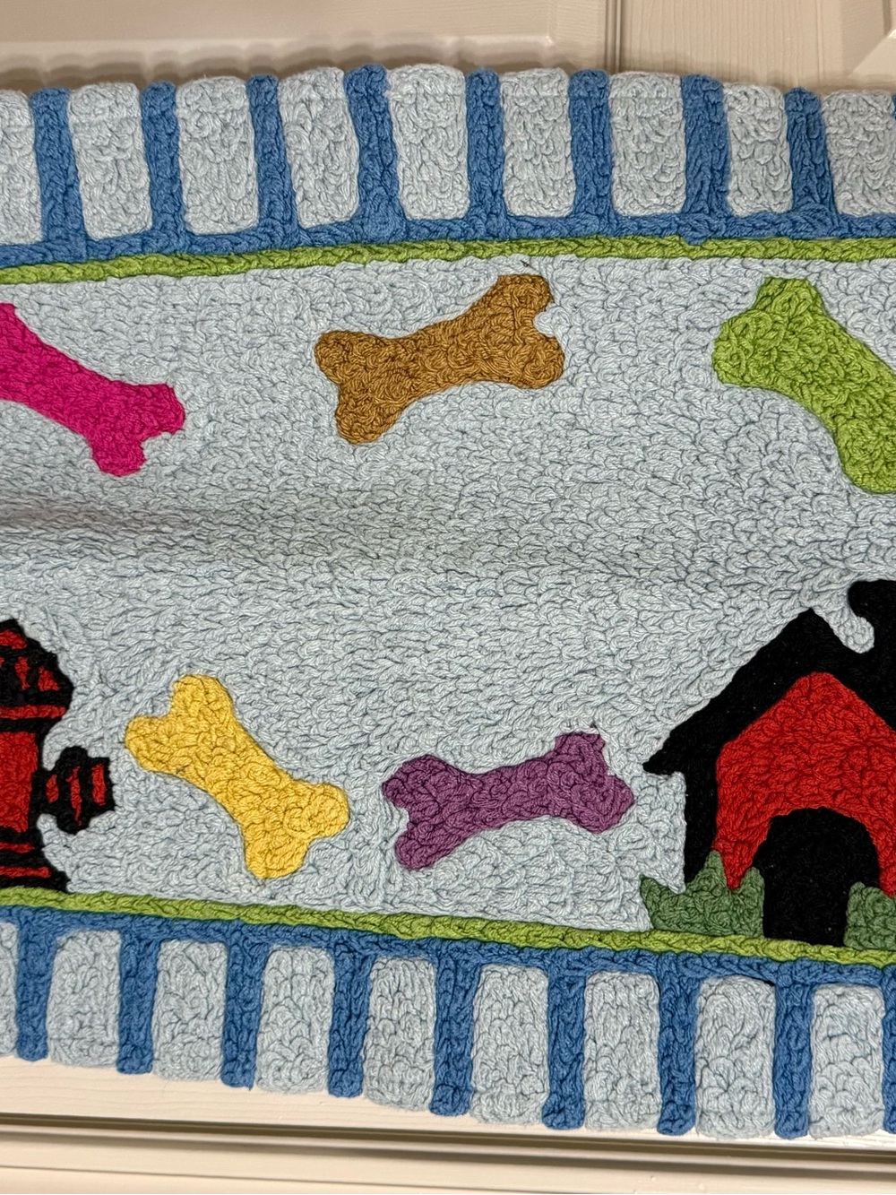 Cheerful Blue Dog Bone Door Mat with Multicolor Accents